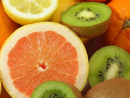 Sliced citrus and kiwi fruit, a bright vitamin-rich fruit spread